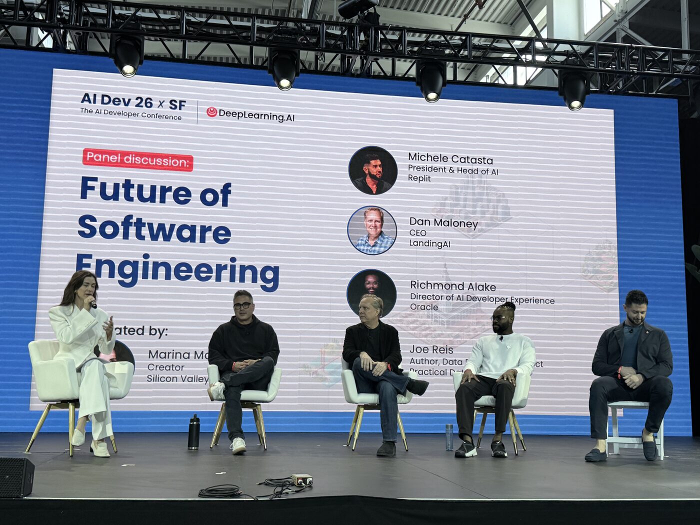 Future of Software Engineering panel on stage: Marina Mogilko moderating with Michele Catasta (Replit), Dan Maloney (LandingAI), Richmond Alake (Oracle), and Joe Reis (Practical Data Media)
