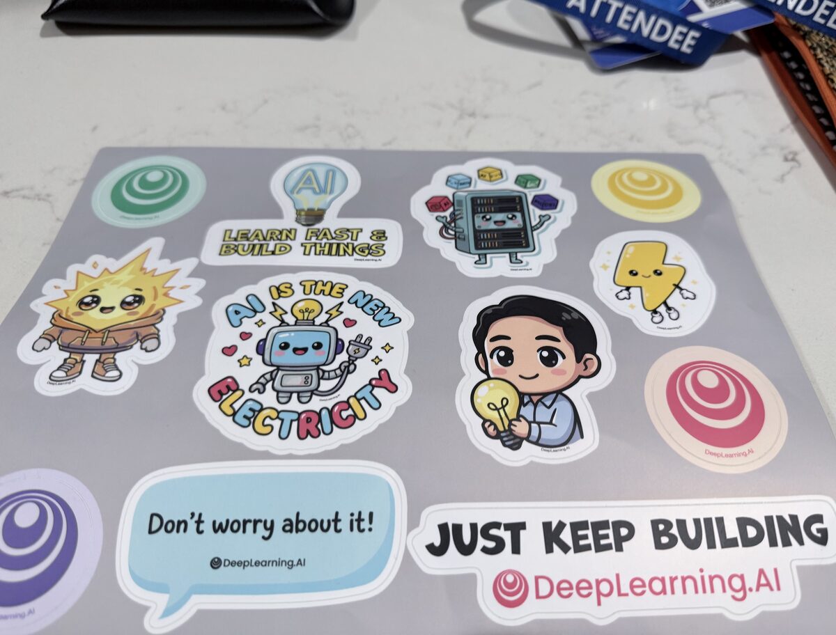 DeepLearning.AI conference stickers and lanyard