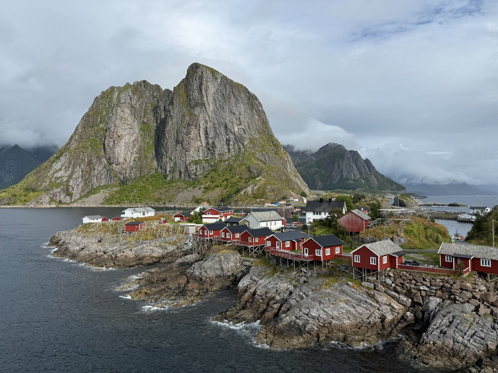 Still water between steep cliffs in a Lofoten fjord